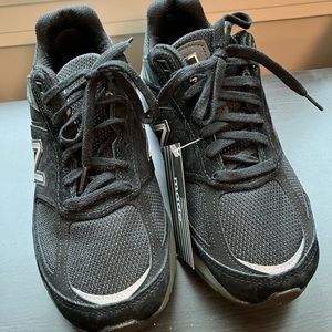 New Balance W990BK5—left has never been worn. Right shoe was worn 4-5 times.